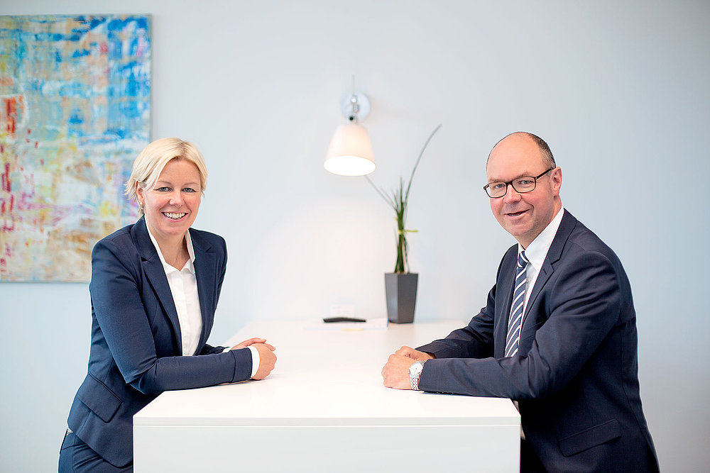 Tanja Kröger und Kai Kröger in einer Besprechung bei GTK Kröger E-Commerce Steuerberater 