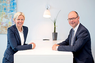 Tanja Kröger und Kai Kröger in einer Besprechung bei GTK Kröger E-Commerce Steuerberater 